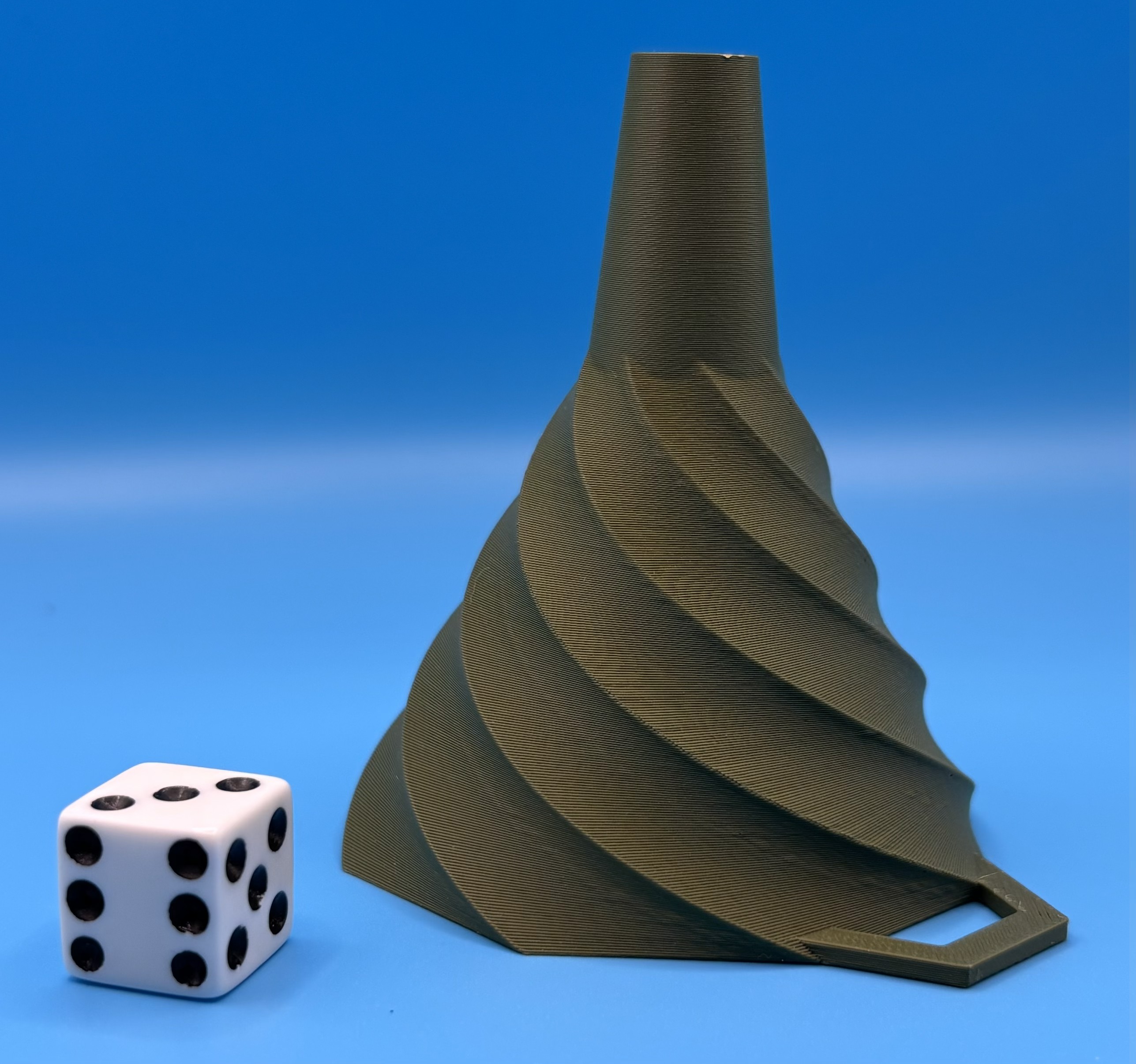 Small 3D printed funnel with spiral design for controlled pouring
