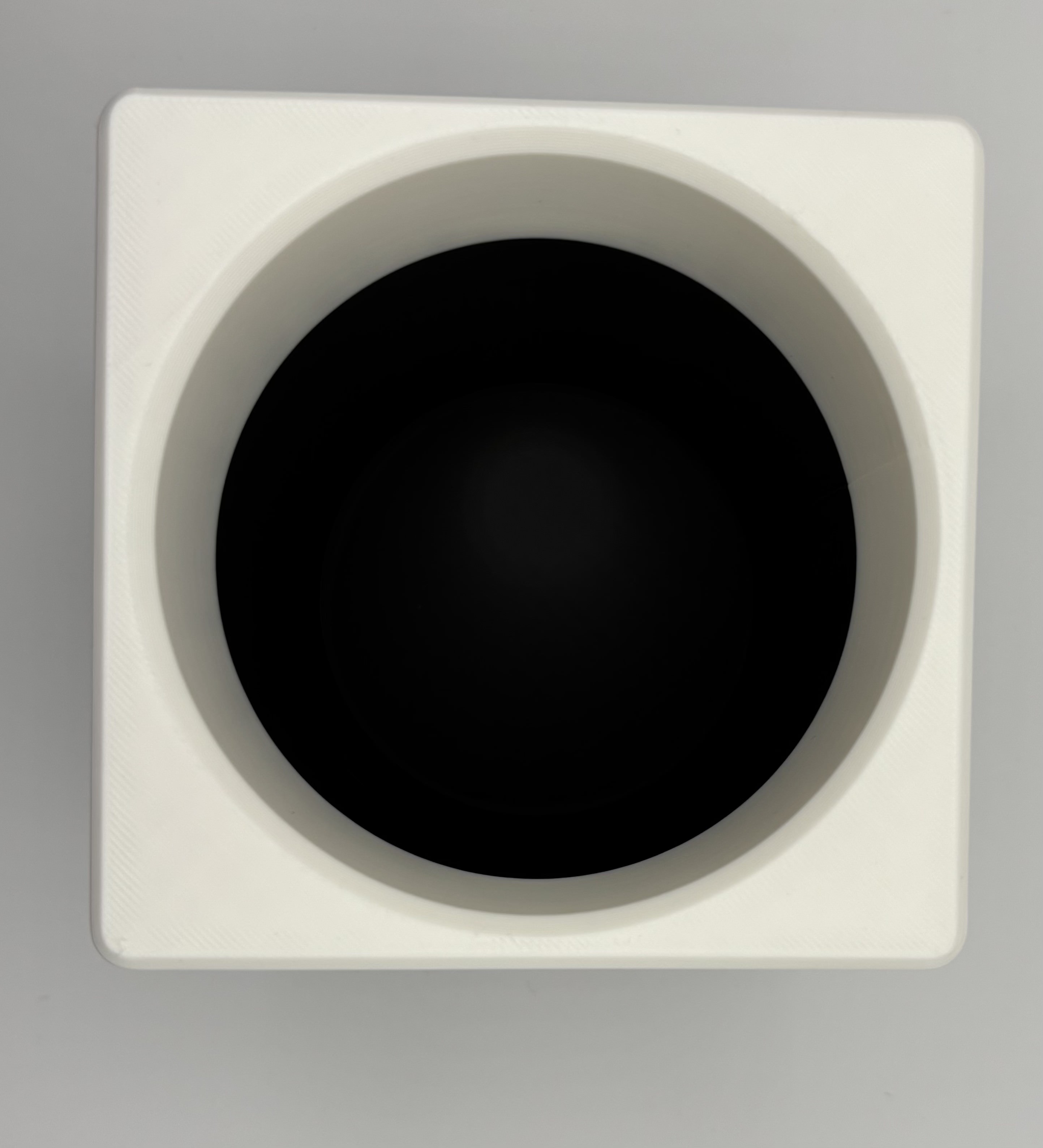 Top view of a 3D printed cup holder adapter for 2019 Mazda CX vehicle