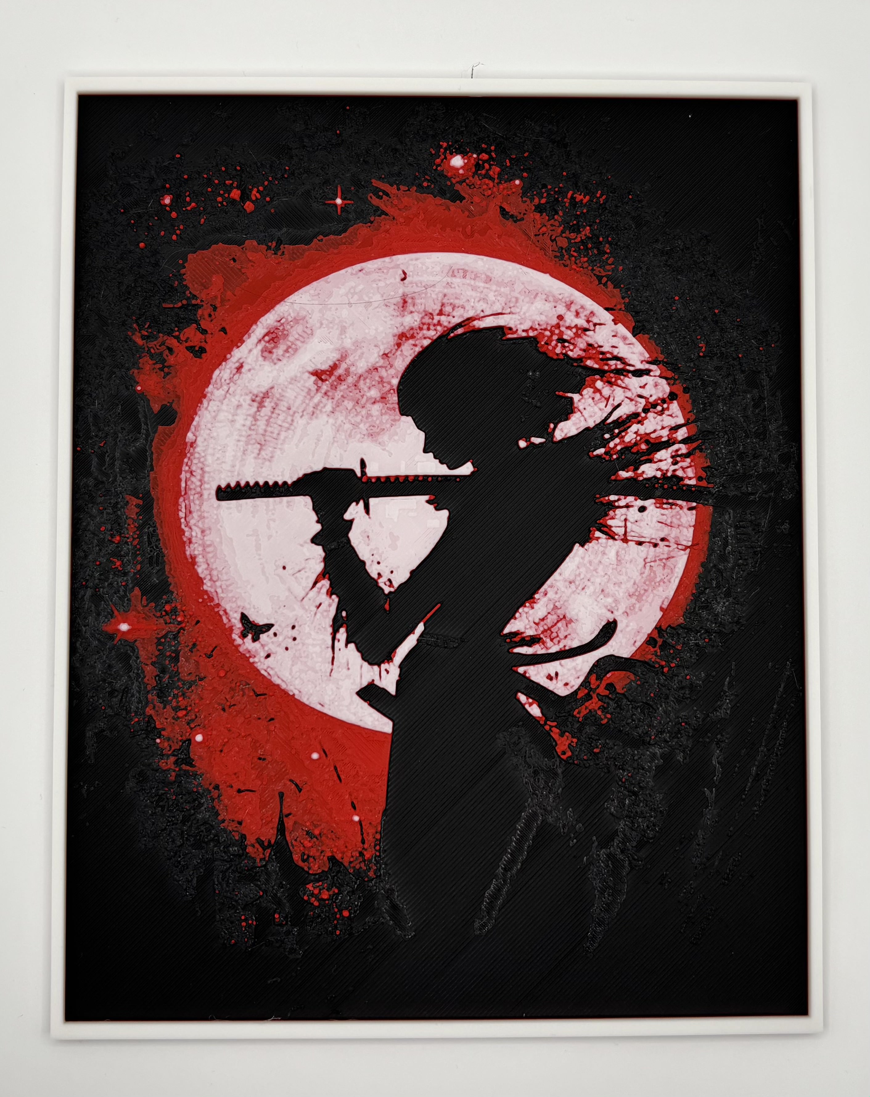 HueForge 3D printed wall art showing a samurai silhouette holding a sword in front of a 		red moon, bold Japanese-inspired design