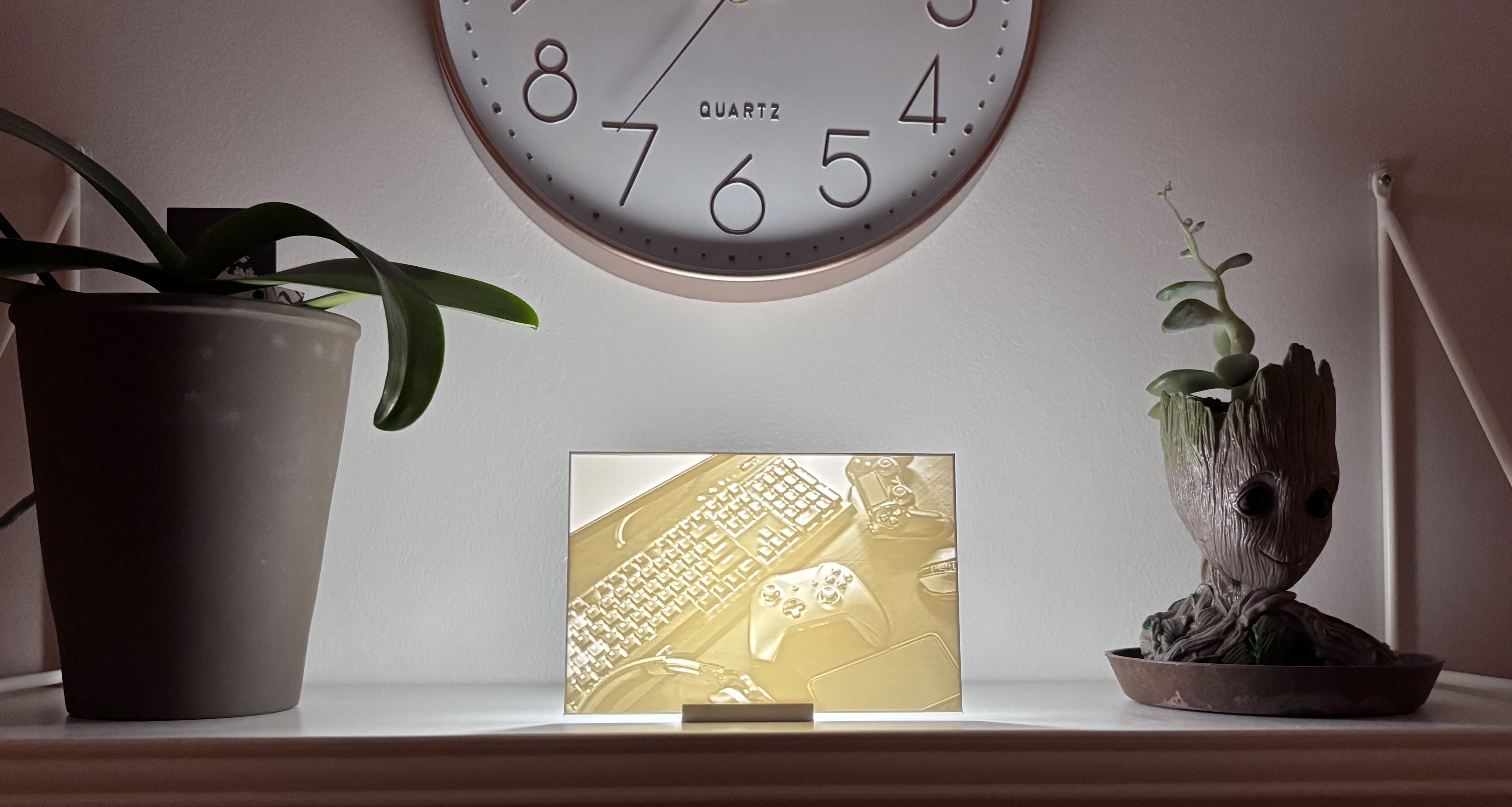 3D printed lithophane depicting a historic city skyline on a hill above a river