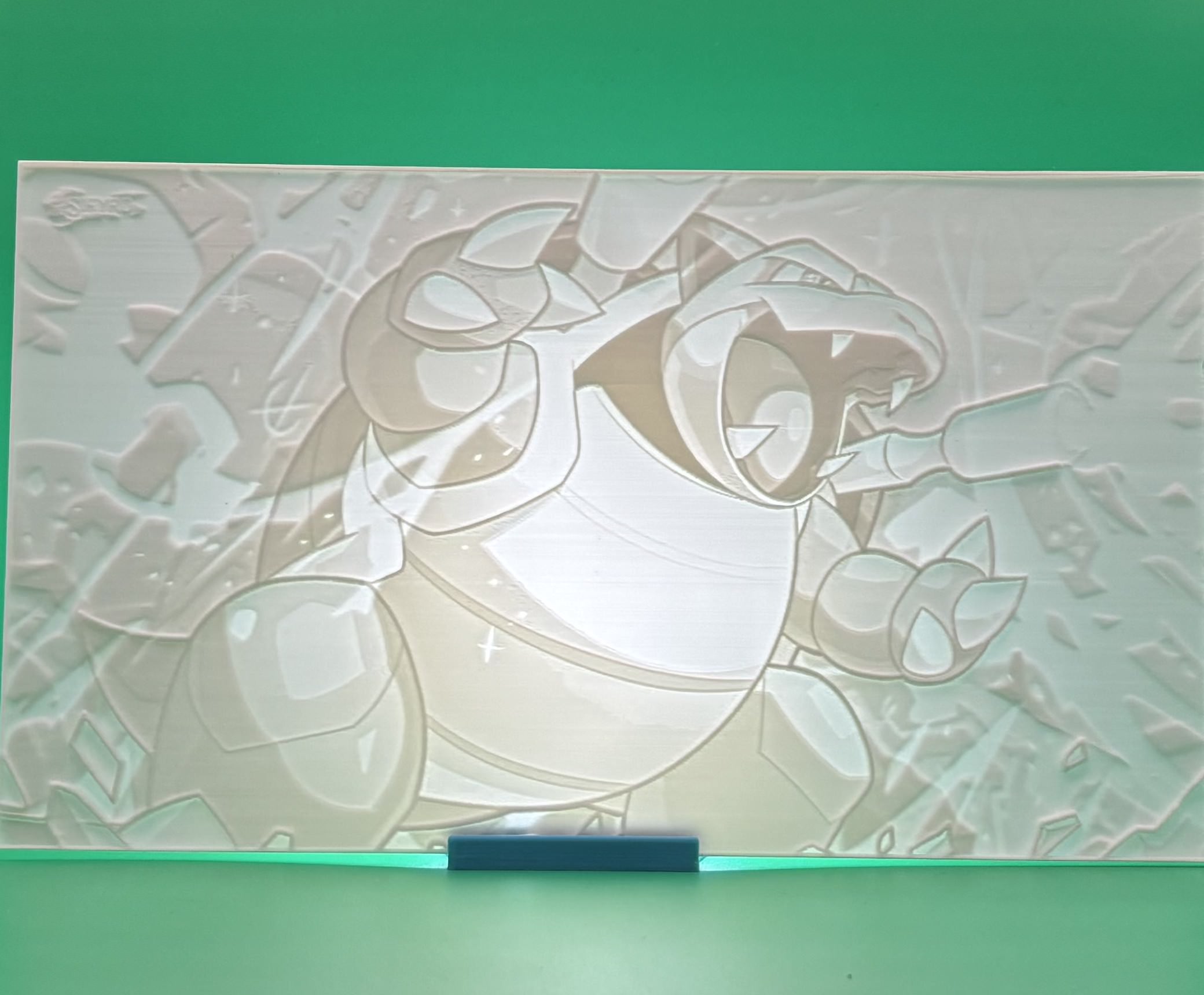 Custom 3D printed lithophane featuring a cartoon-style armored creature in an 		action pose, backlit anime-inspired wall art