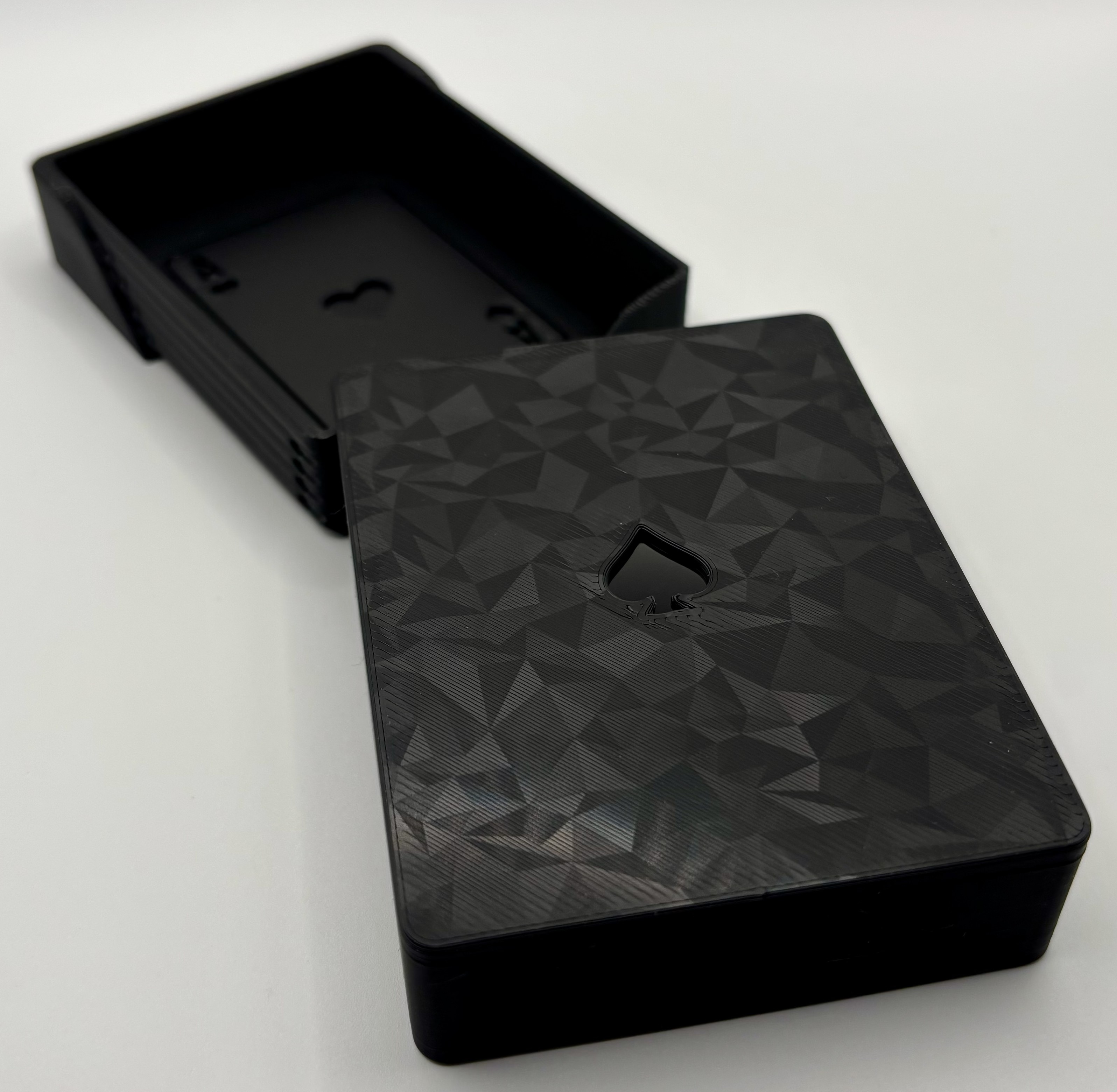Open 3D printed deck of cards case showing interior card storage